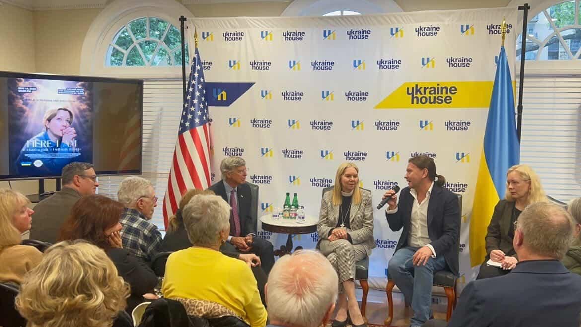Guests attend the Ukraine House presentation of Here I Am, a Ukrainian short film about faith, loss, and military chaplaincy.
