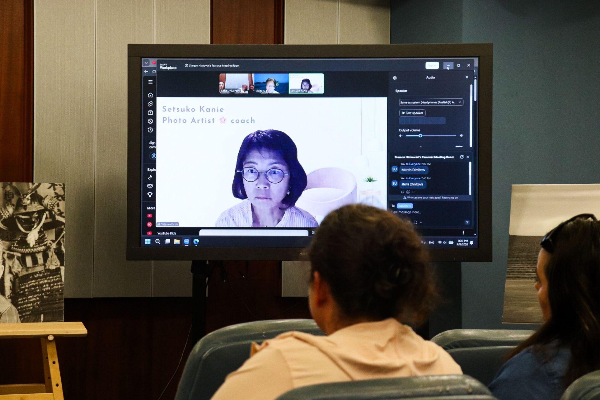 Setsuko Kanie appearing on video screen during the Somnia Disaster presentation
