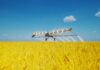 America Should Spend More on DARPA. I’m Publishing My Heavy-Lift Design to Help. Edison Aerospace Heavy 1 distributed-electric agricultural aircraft flying above a field