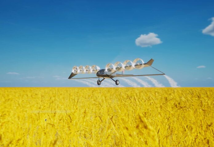 Edison Aerospace Heavy 1 distributed-electric agricultural aircraft flying above a field